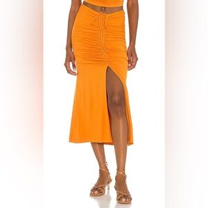 house of harlow x sofia richie sunnie mini skirt in rich orange. Size M